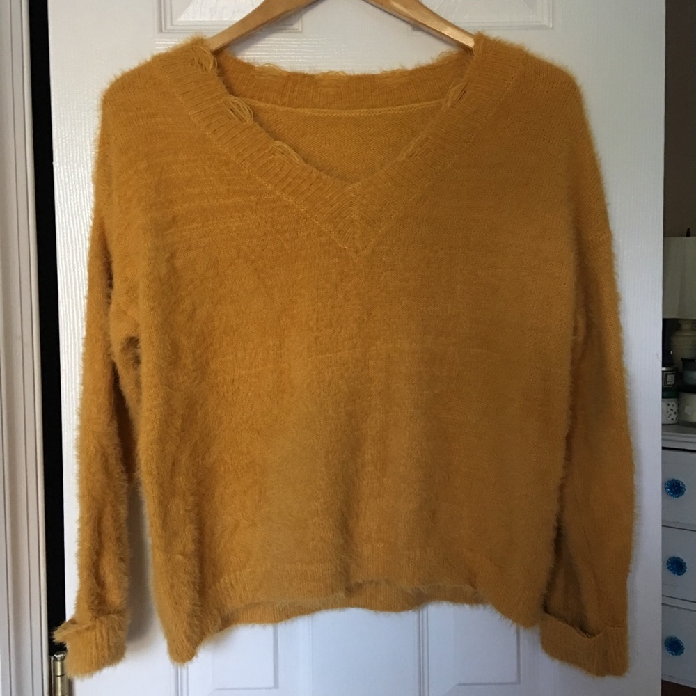 Distressed sweater
